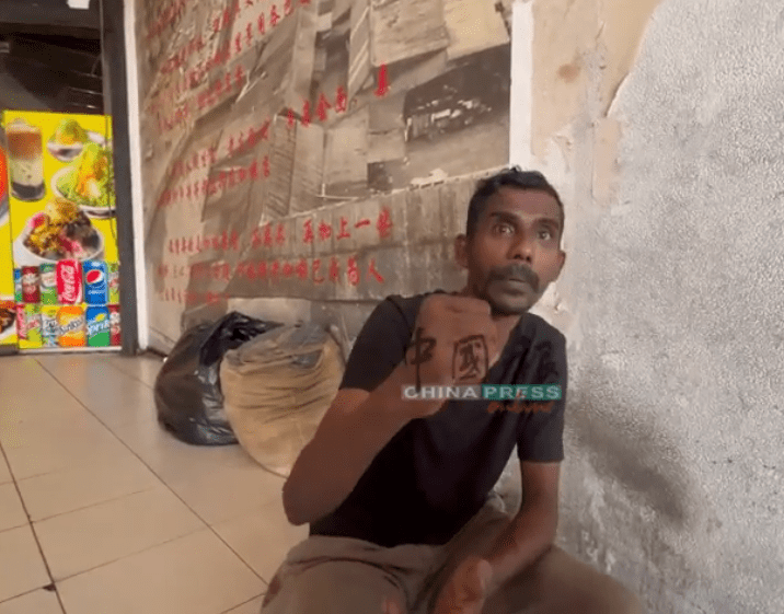 Homeless man in chicken bones prank talking to reporter