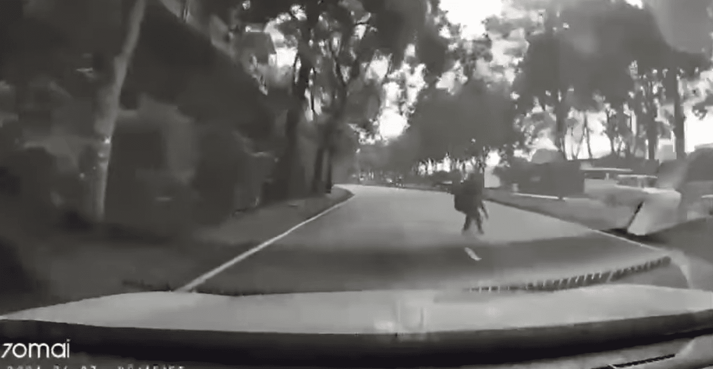 Homeless woman runs to the middle of the road in JB