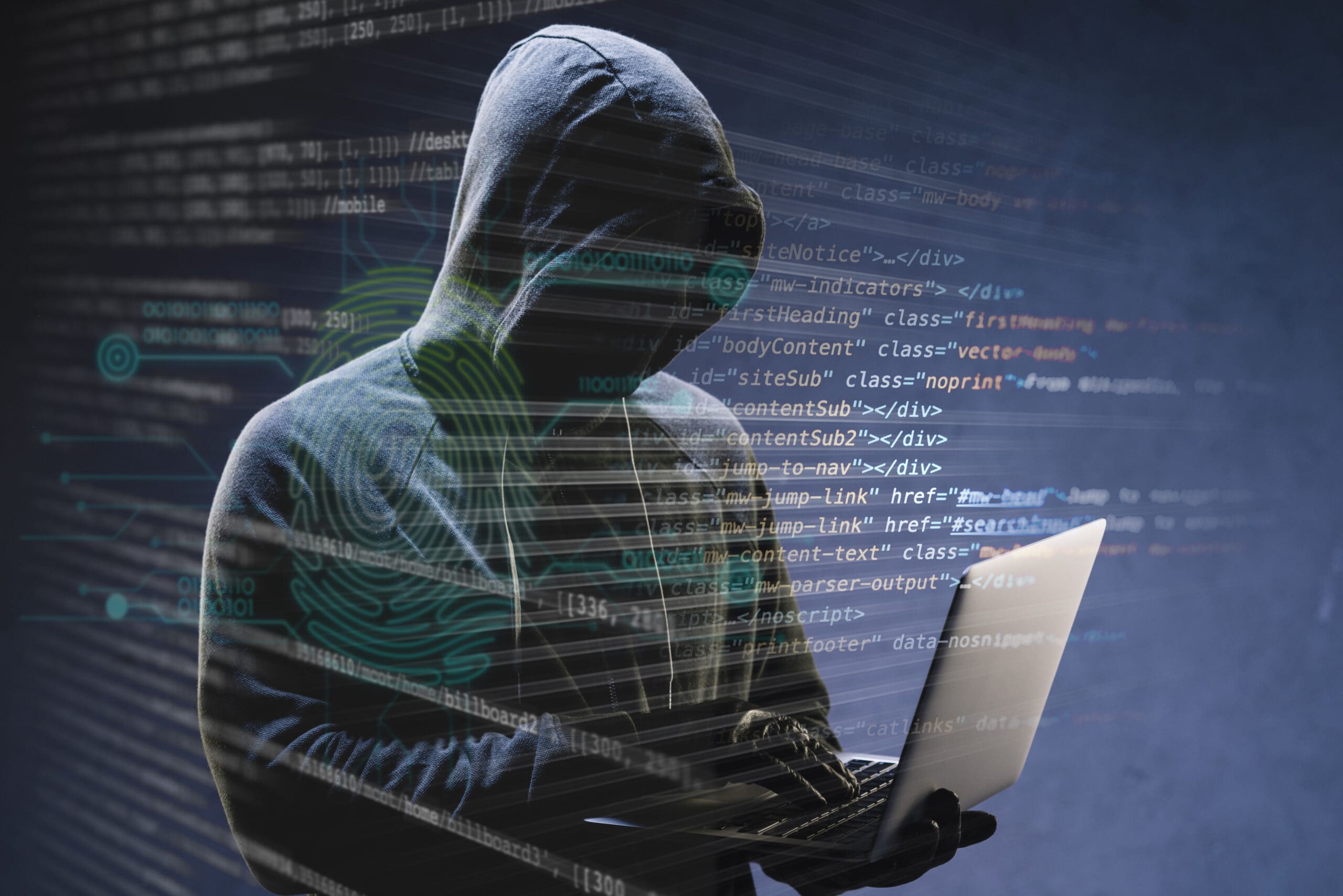 Scammer is holding his laptop. 