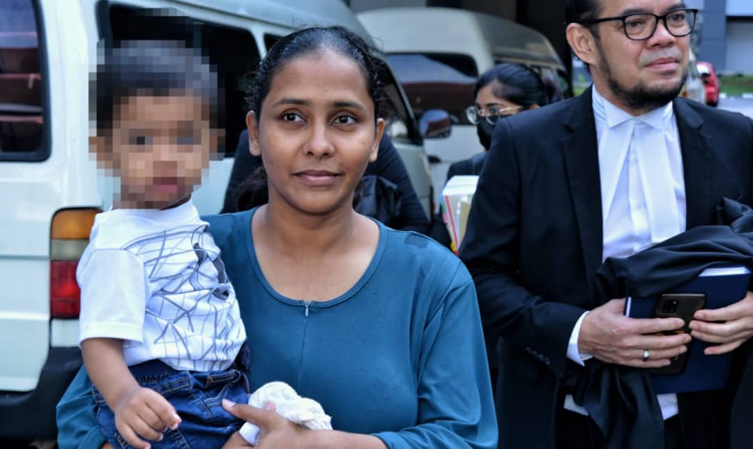 R Devaki with her kid