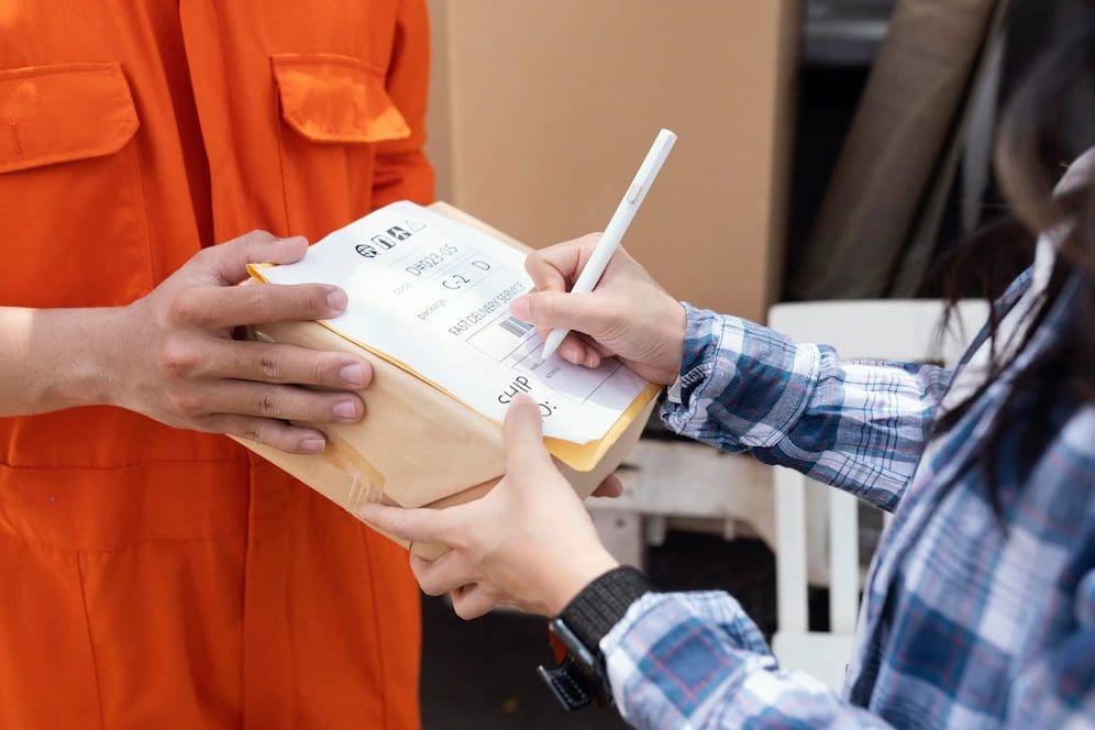 Girl receiving her parcel 