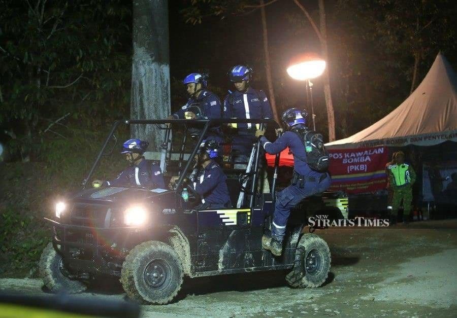 Rescuers at Batang Kali landslide