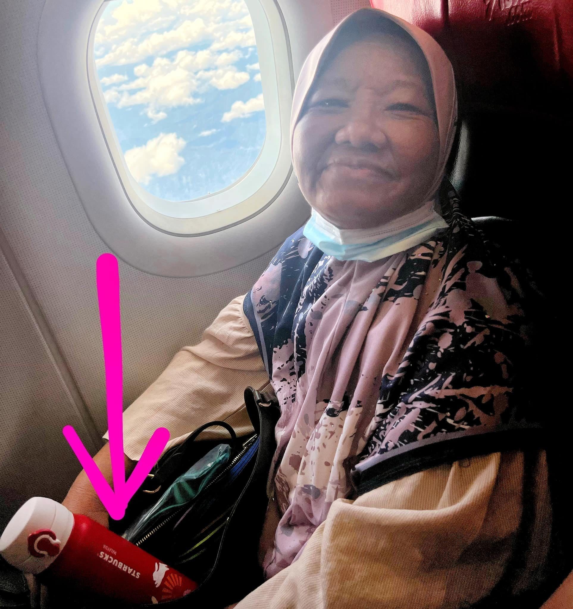 Syukor Majid's mum holding a Starbucks tumbler