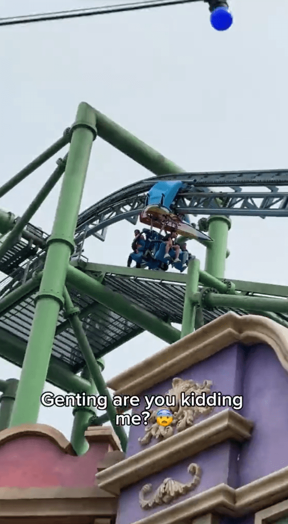 msian stucked in the mid air while riding a ride at genting highlands