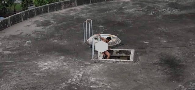 39yo M'sian Woman climbs into water tank naked