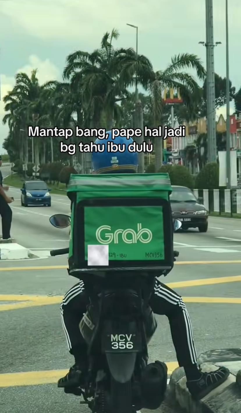 A closeup of his bag with his mother's phone number on it incase anything happens to him