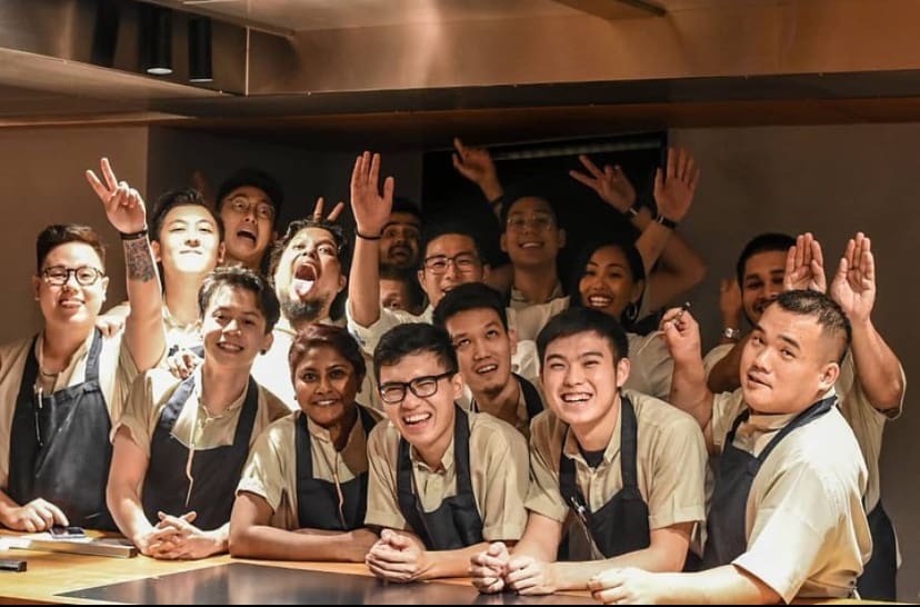 Mike Choo, a 26-year-old chef  with his colleagues