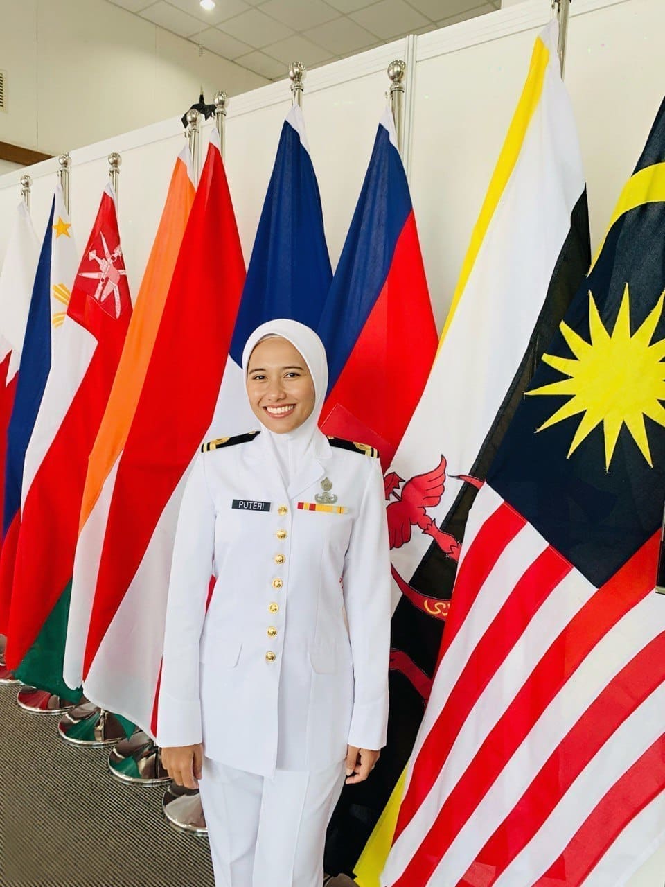 Puteri Shazwani Megat Ahmad Shariman stuuned in white uniform