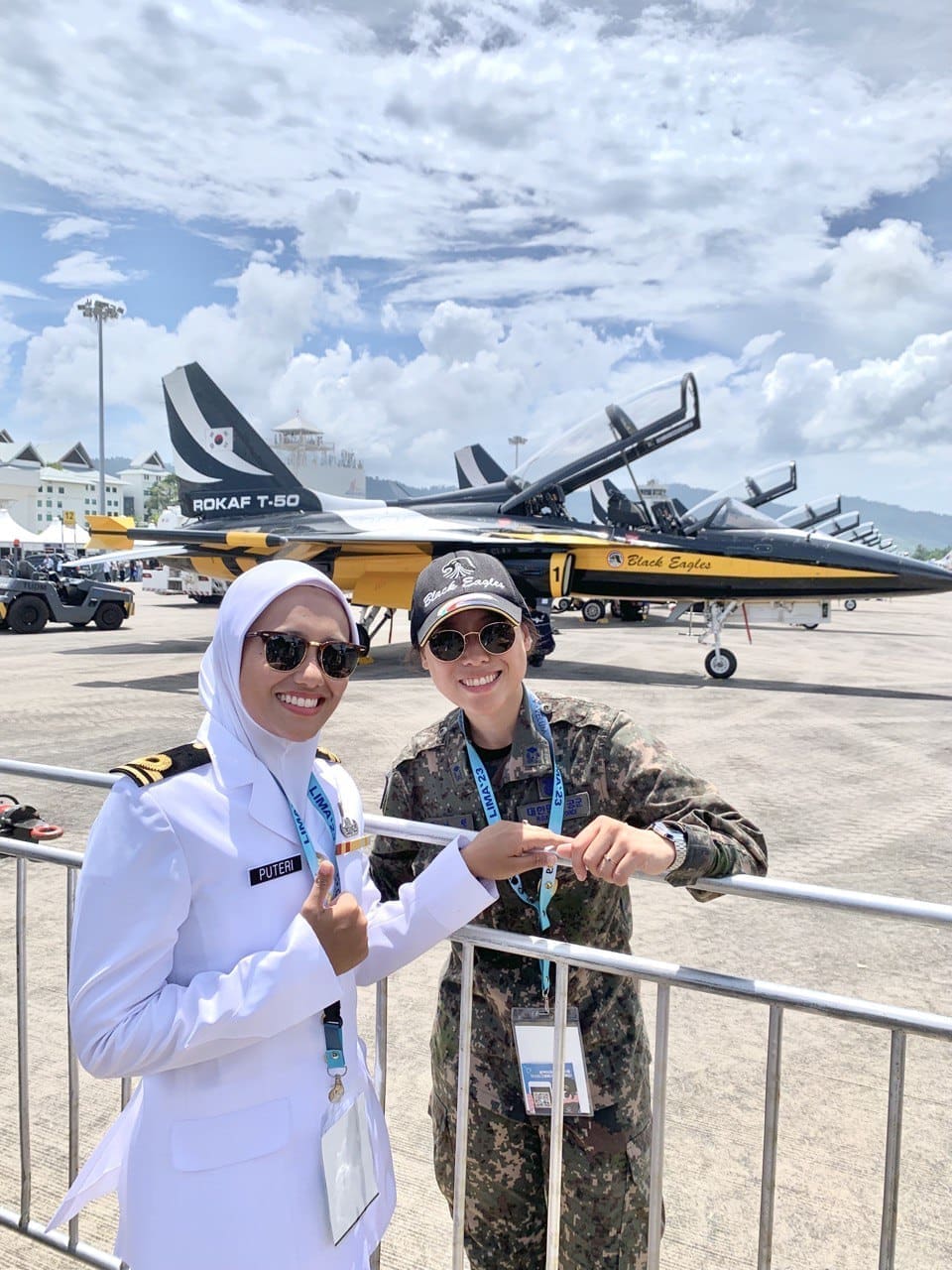 Puteri Shazwani Megat Ahmad Shariman with female colleague