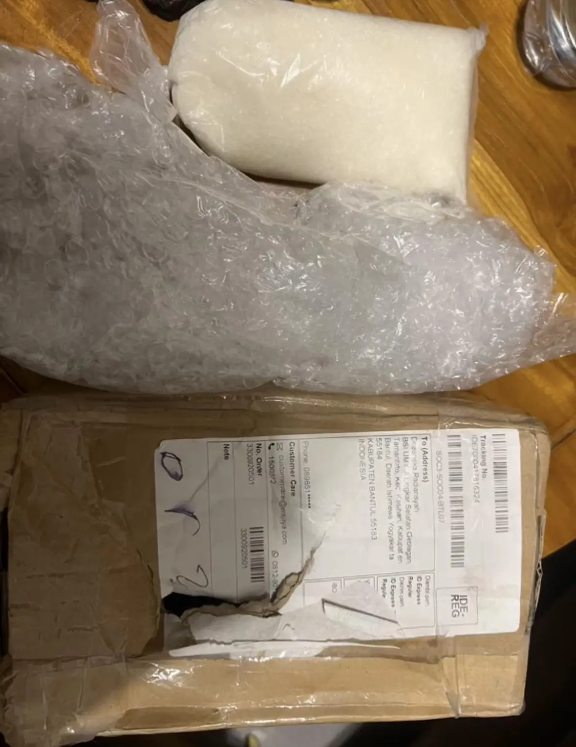 Indonesian Woman Stunned To Discover iPhone 16 Plus She Ordered Was Swapped With 1KG Of Sugar