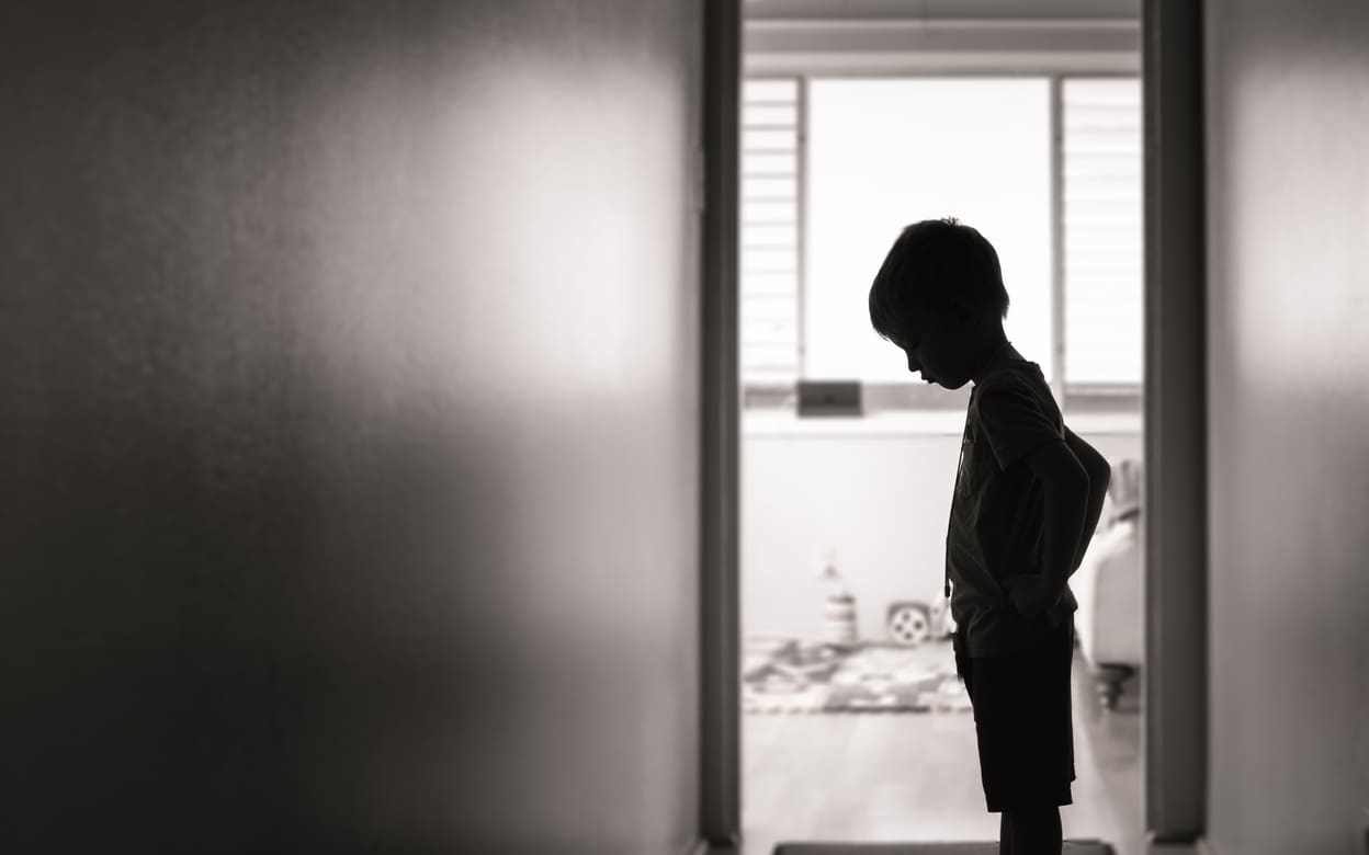 Kid standing  in bnw background