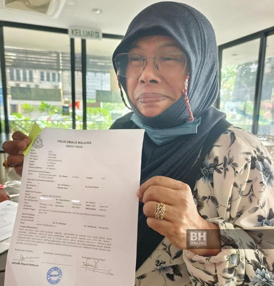 Datuk Jabidah Monseri shows police report