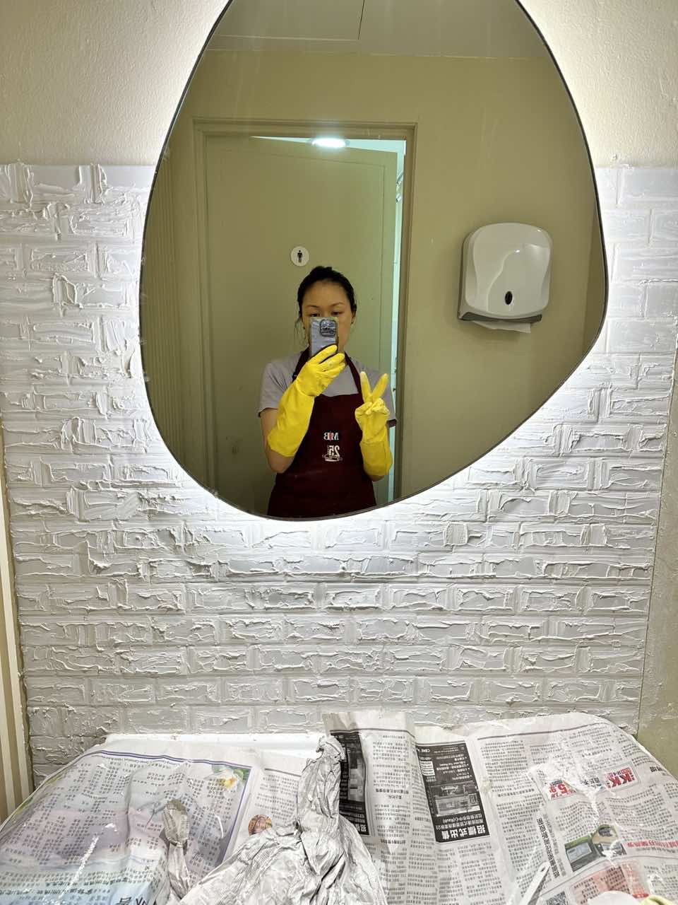 Jia Li fixing the sink