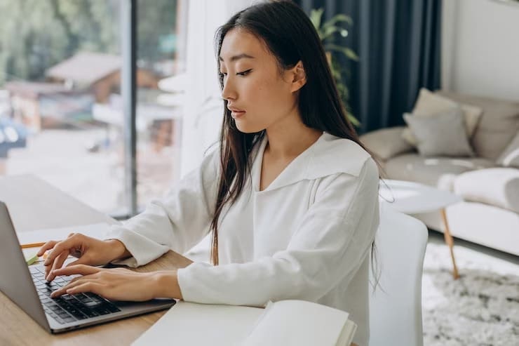 Girl does research on her laptop