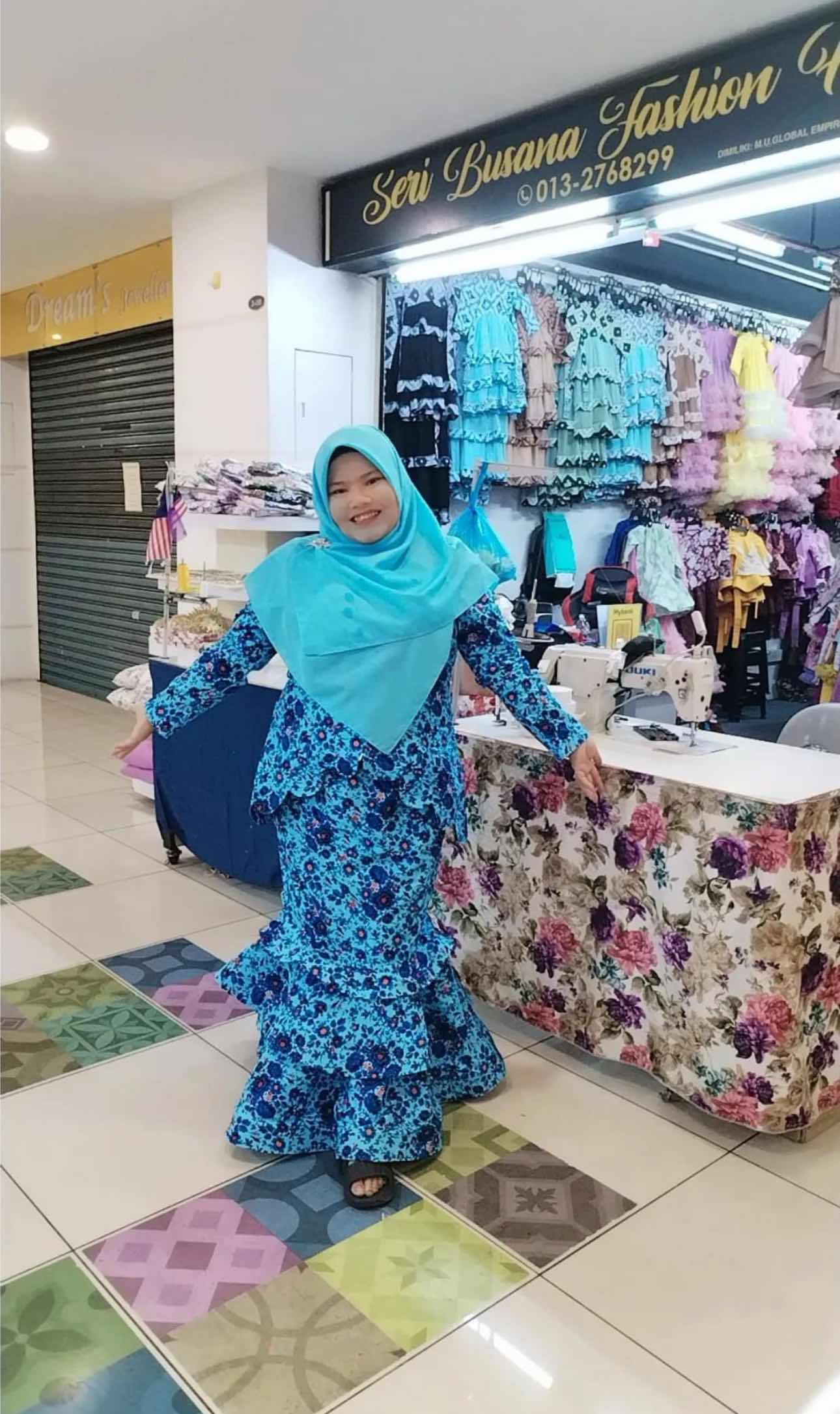 A tailor, Mahani Udit, from Bukit Jambul Complex located in Penang