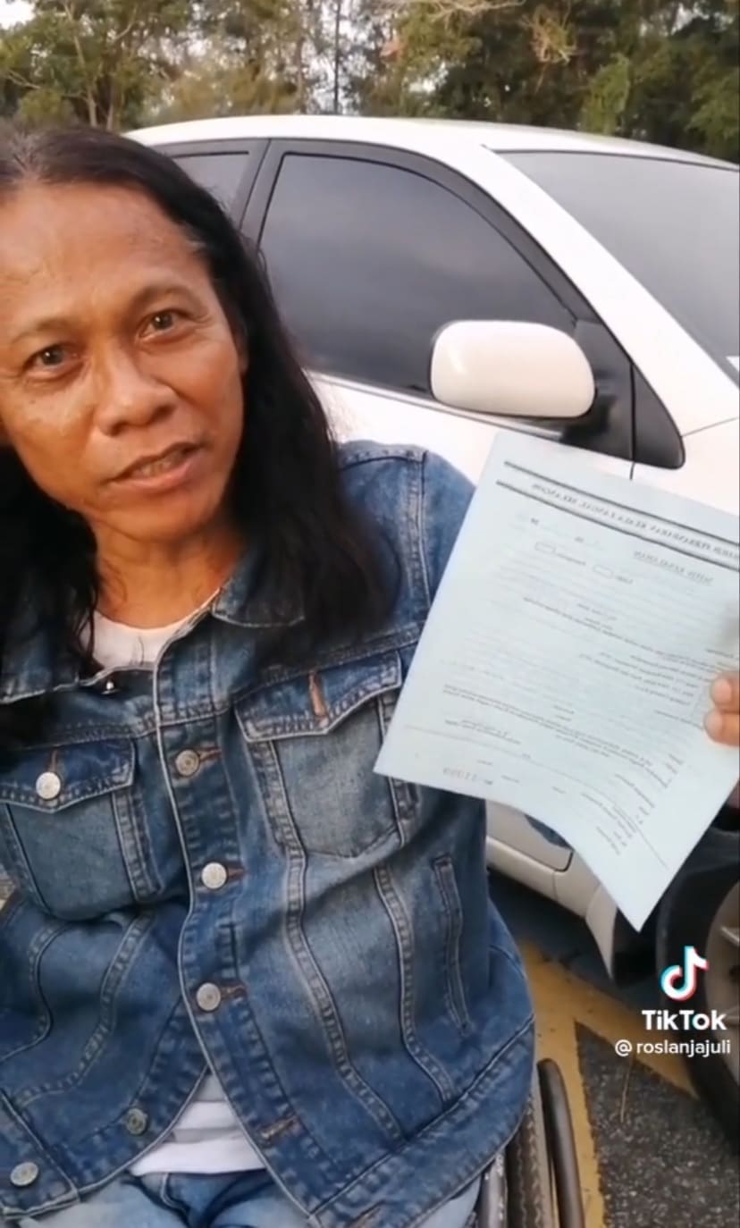 Disabled M'sian Man In A Wheelchair Sued RM20 For Parking His Car In OKU Parking Lot