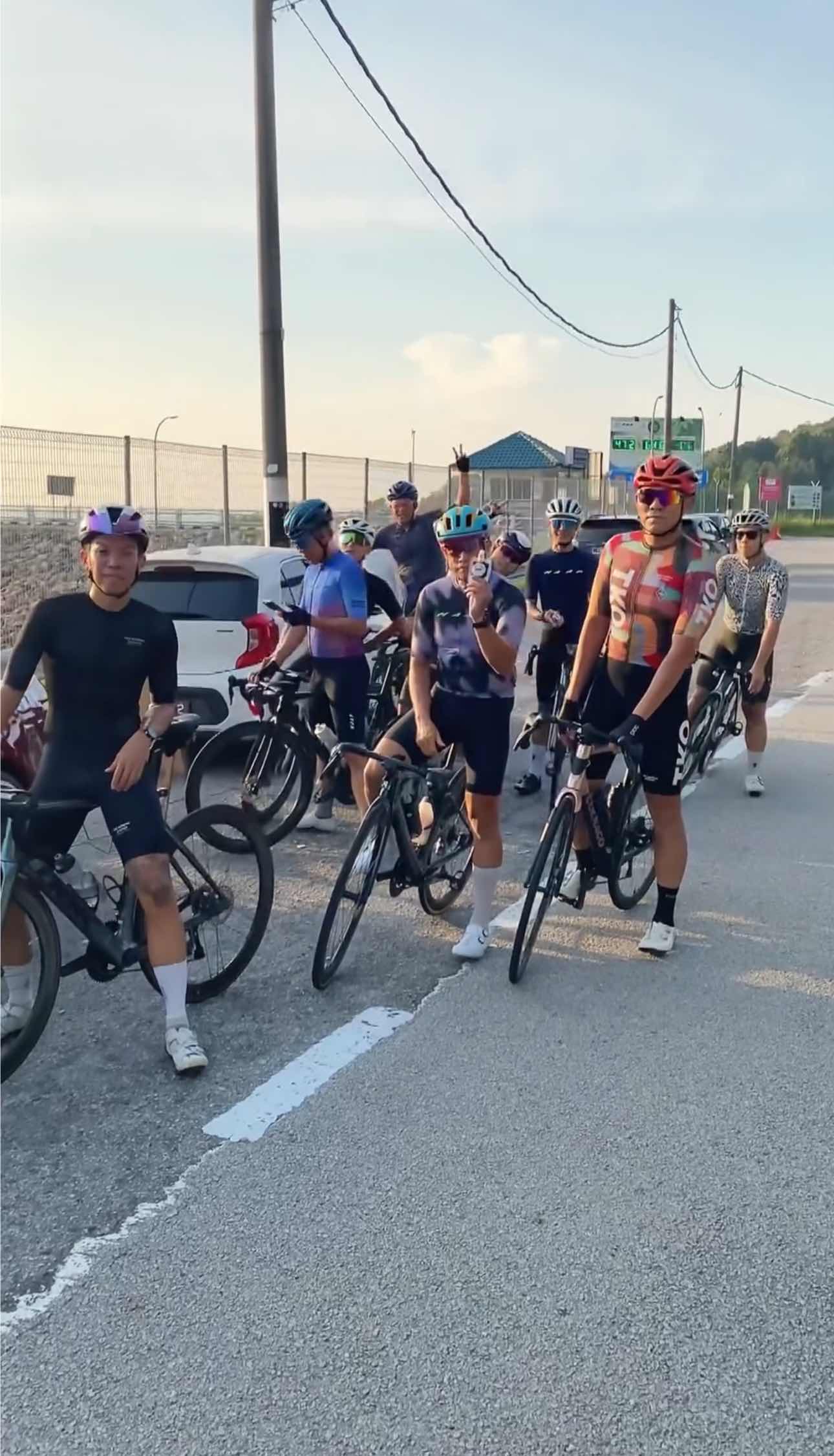 Cyclists buying coffee from Mustang Coffee