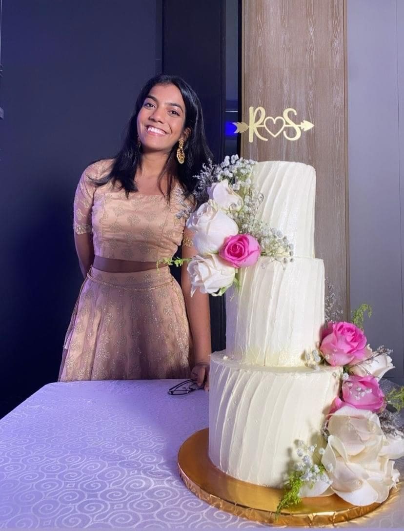 Sonea Edwards with her own baked cake 
