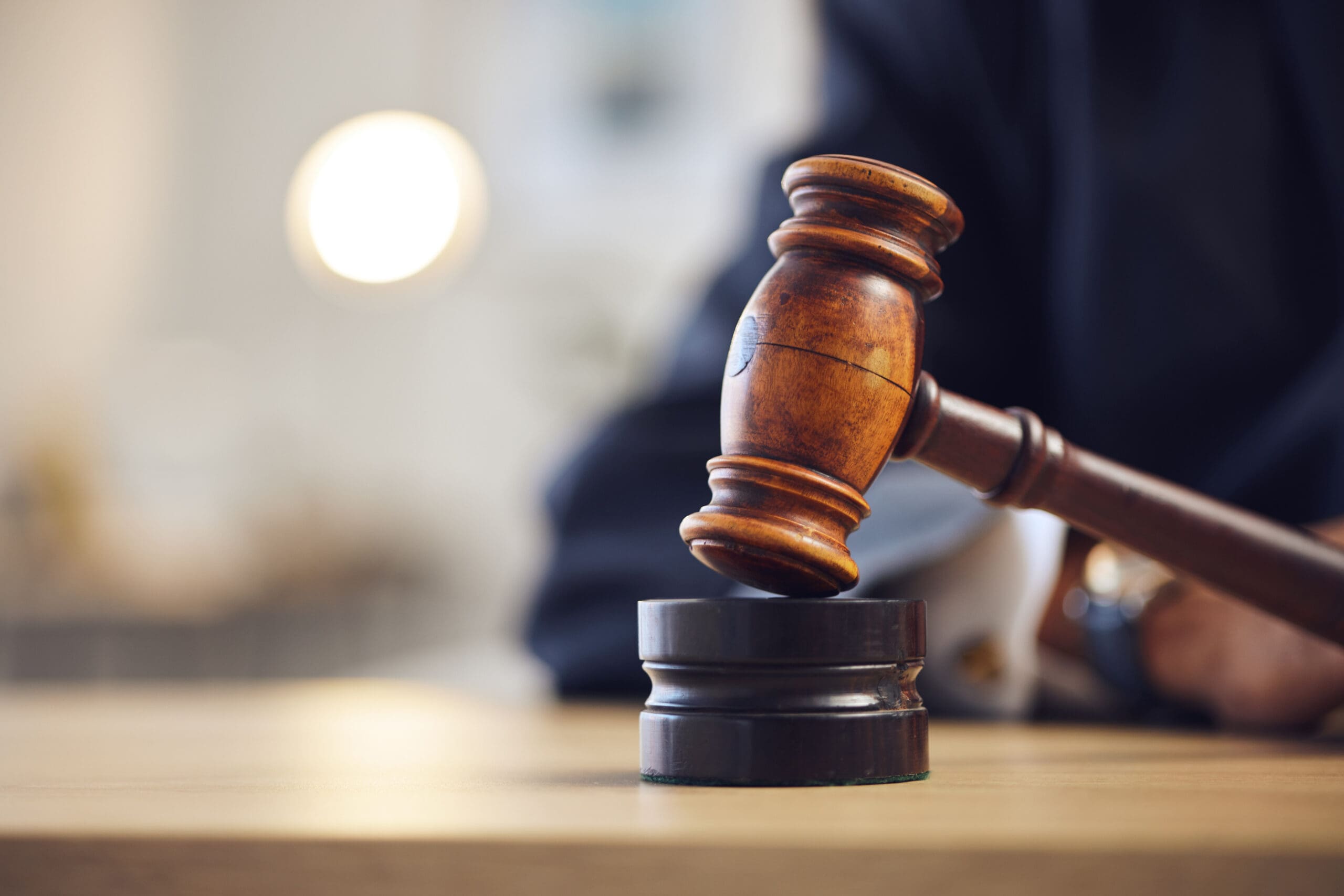 Judge using the gavel at court