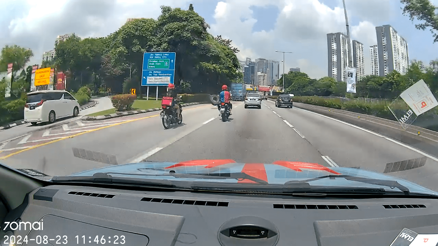 Lorry tyre flying towards M'sian man