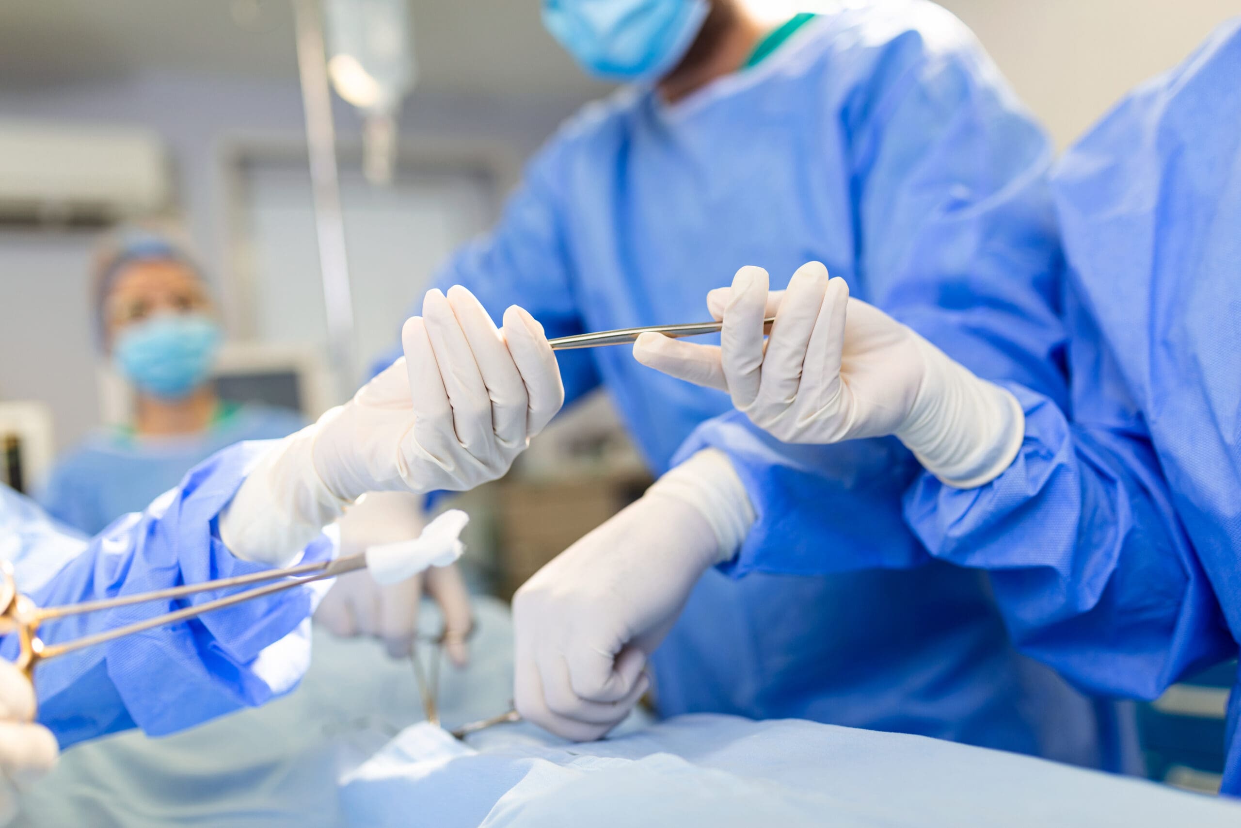 surgeons performing autopsy