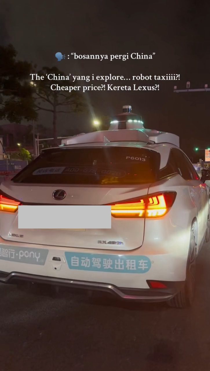 msian rides self-driving taxi in China Lexus