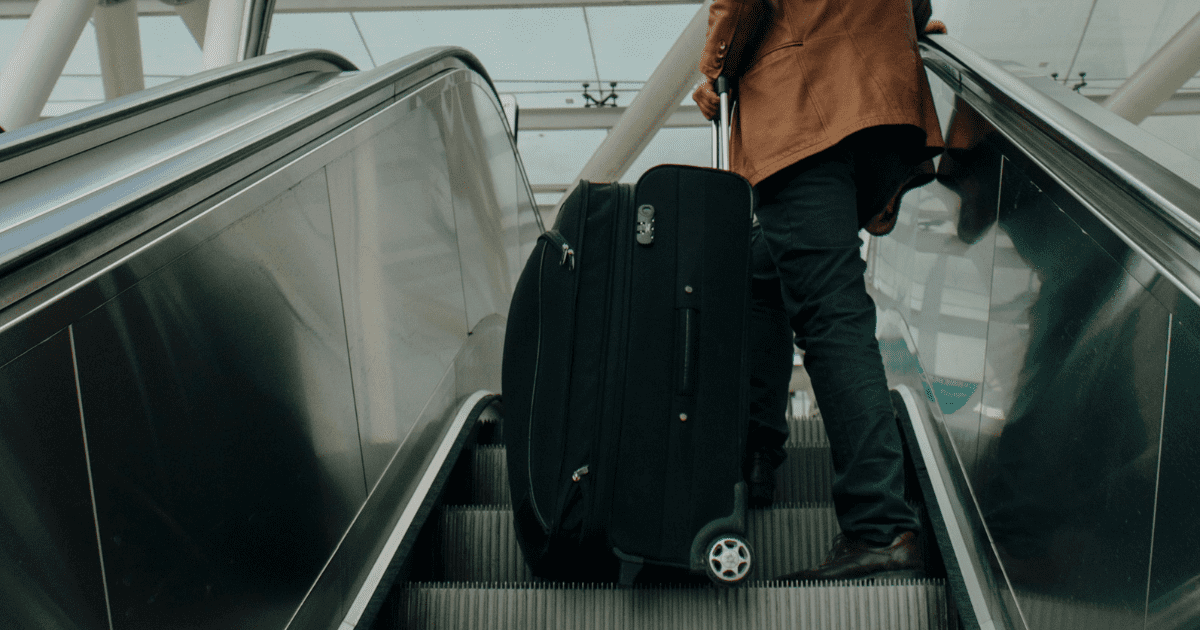 Luggage blocking escalator