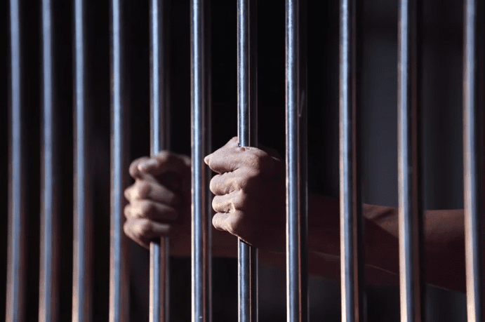 man behind bars