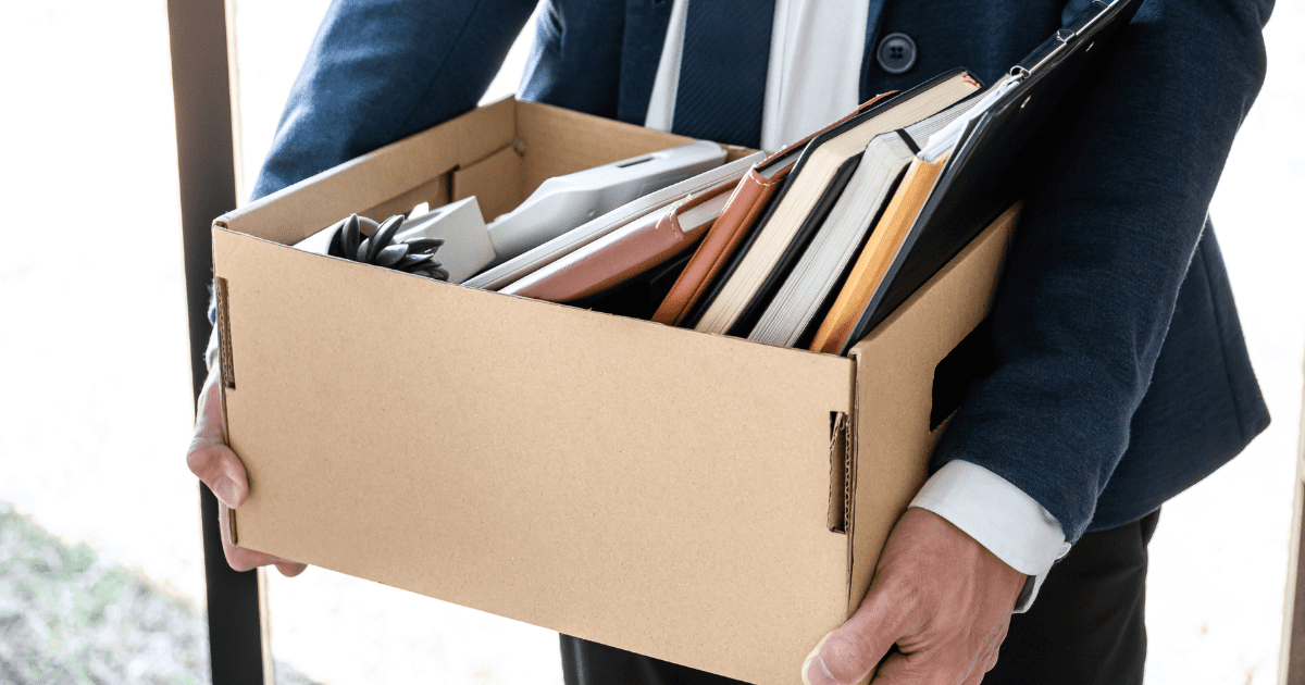 man carrying a box