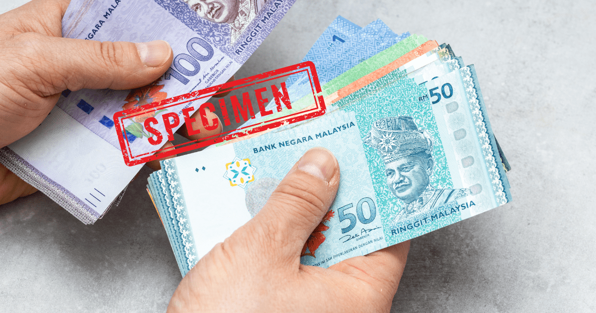 man counting money
