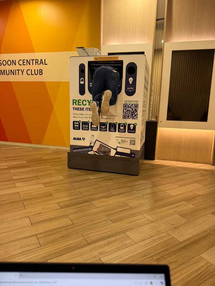 Man dives into e-waste bin (1)