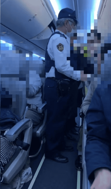 Man escorted off plane over seat freakout