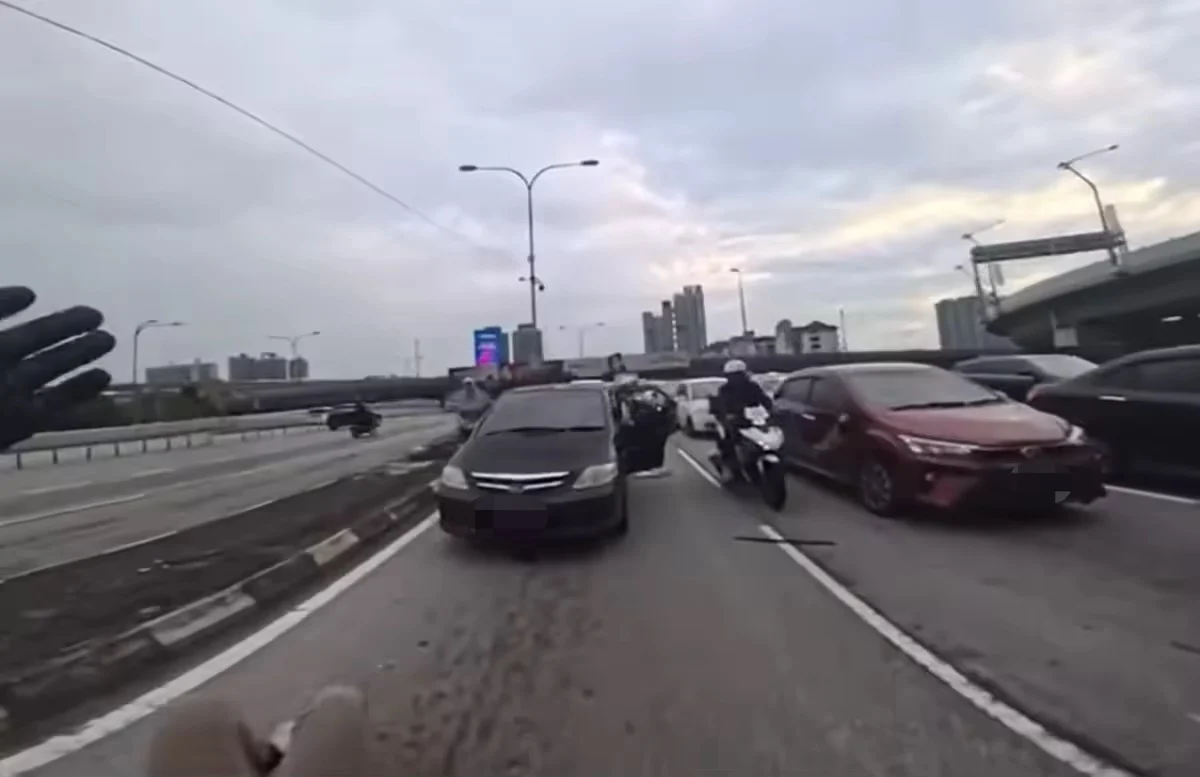 Man flung off bike by car door (1)