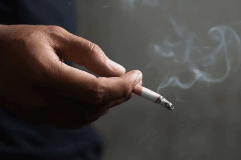 Man holding a cigarette