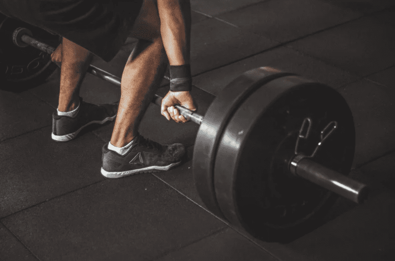 Man lifting dumbbells