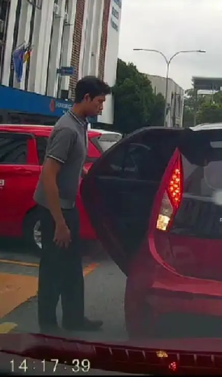 man opening a car's door