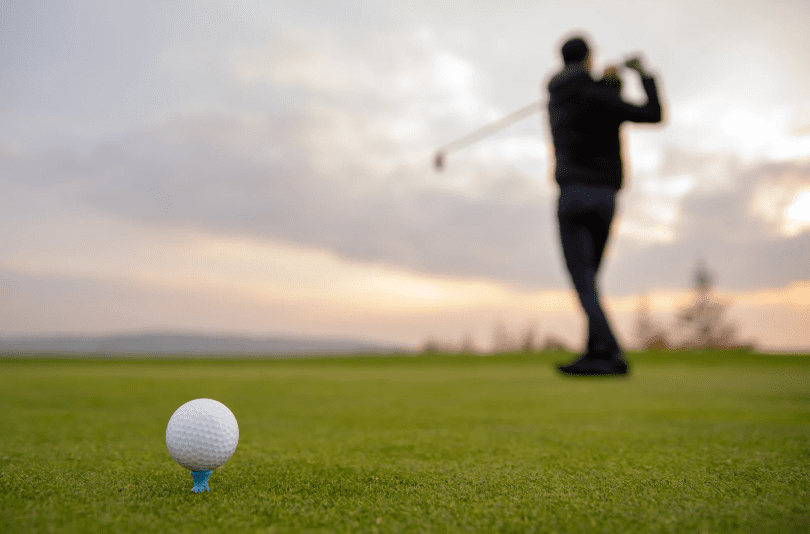 Man playing golf