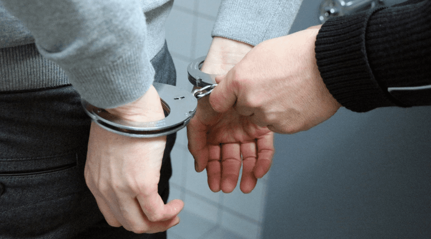 Man put in handcuffs