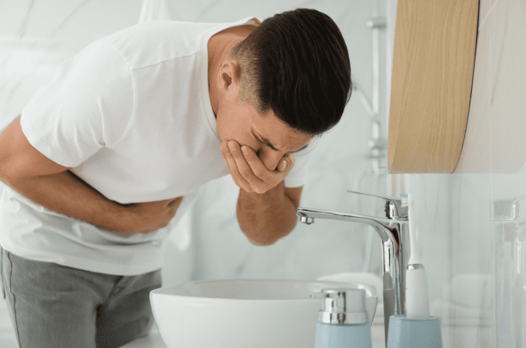 Man suffering from food poisoning