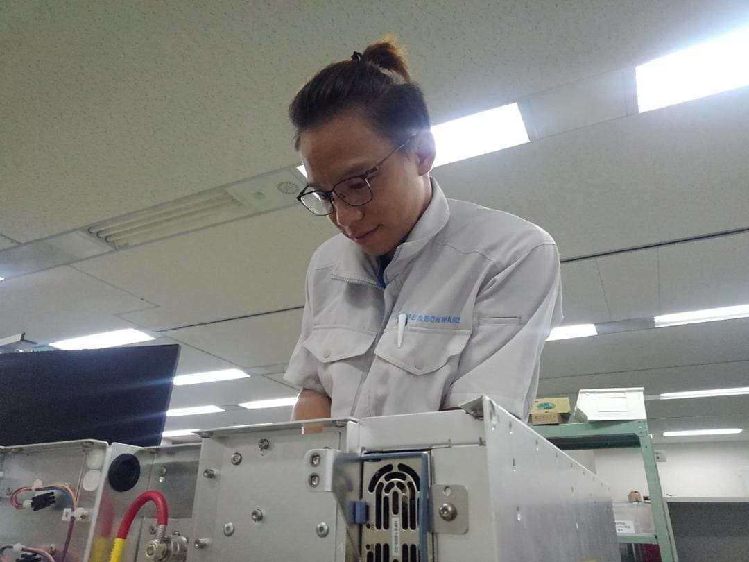 Matthew working on a device