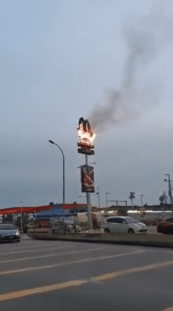 Burning McDonald's signboard in Johor
