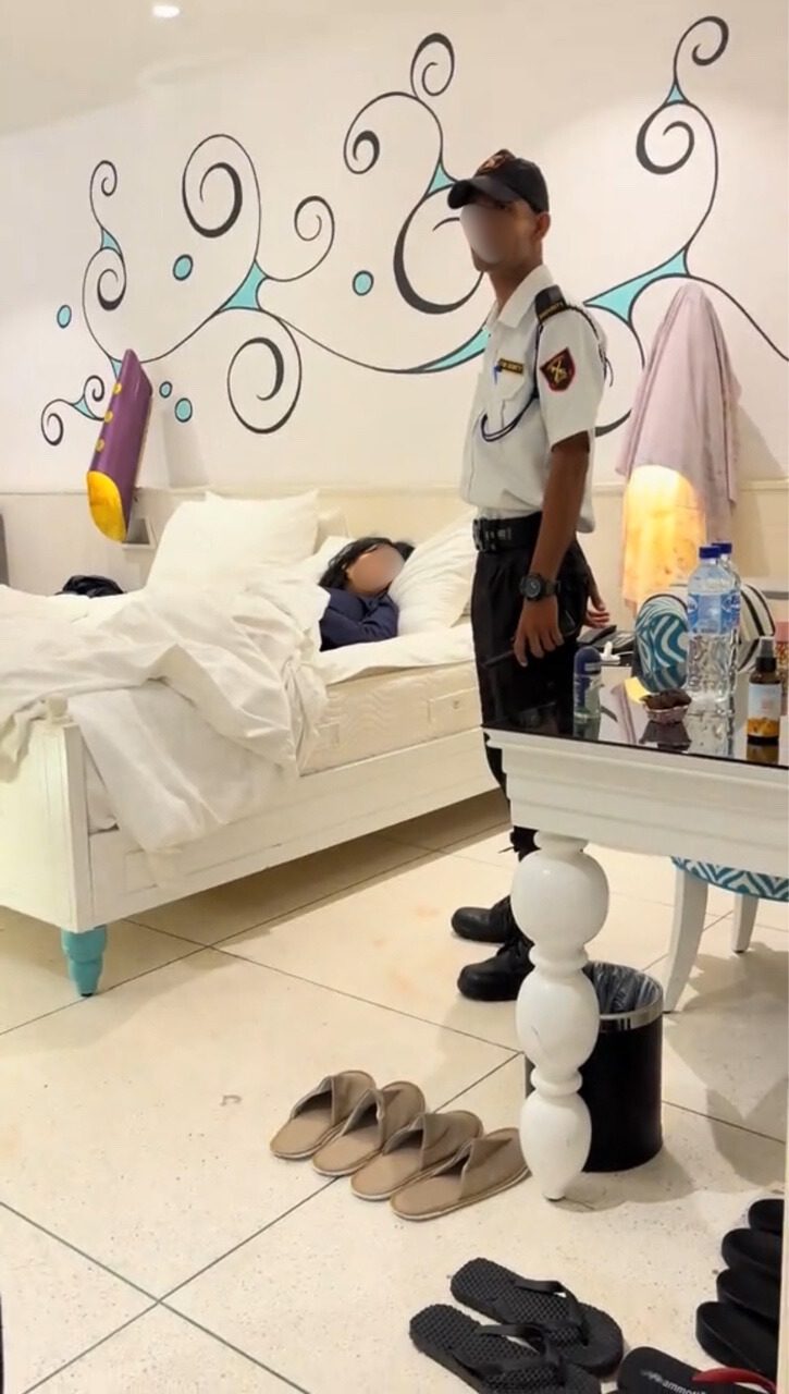 msian couple shocked find unknown woman hotel bed Langkawi drunk security 