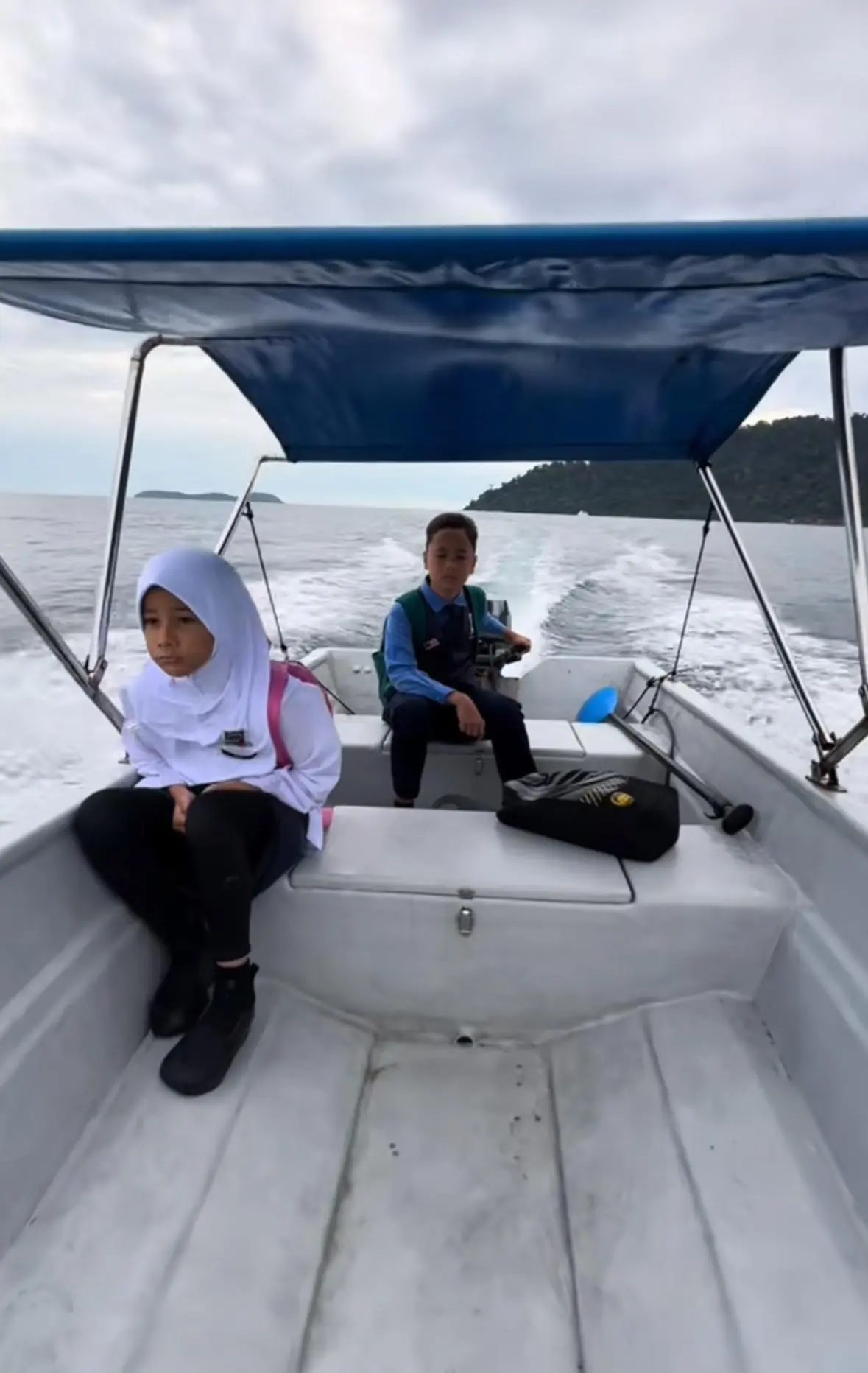 M’sian Father Rides A Boat To School Daily With His Kids For 7 Years So They Can Learn Like Everyone Else
