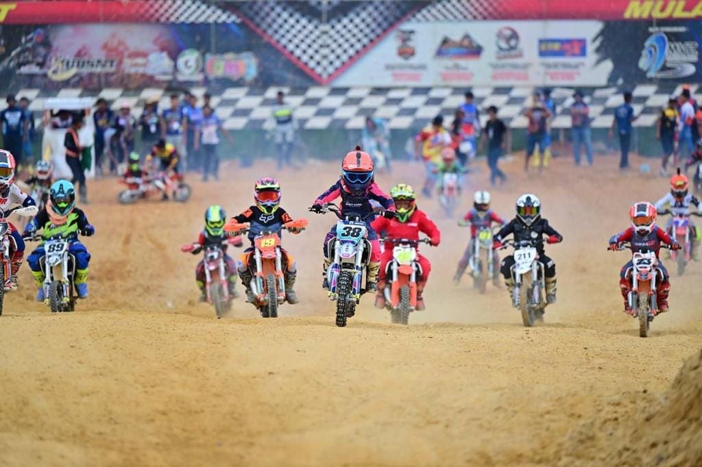 msian kids competing at a motocross