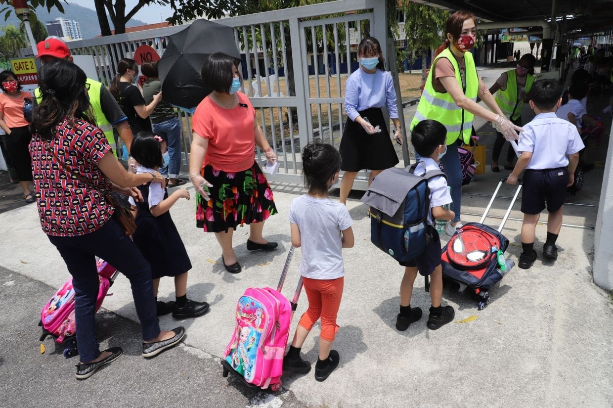 Primary school students going to school