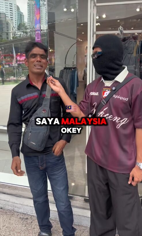 msian man interviewing foreinger