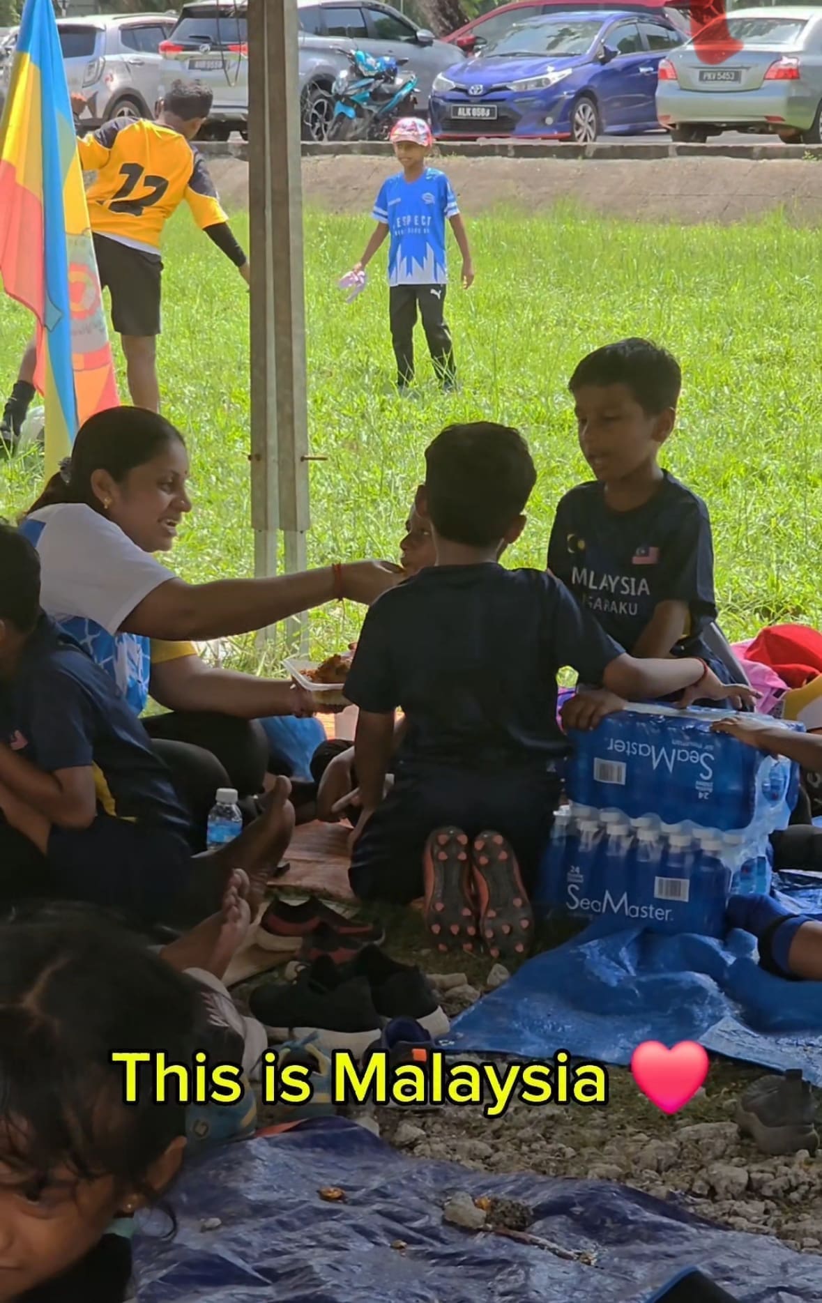 M'sian Teachers Touch Hearts By Lovingly Feeding Students During Football Tournament