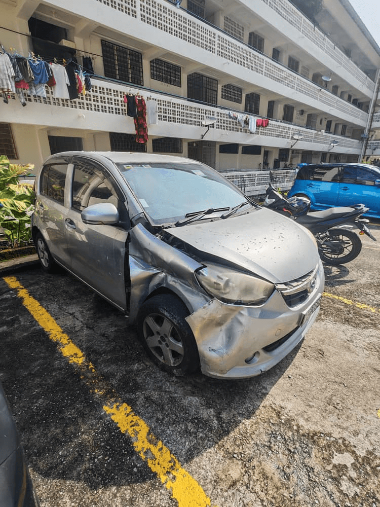 Myvi damaged by rocks in Ampang