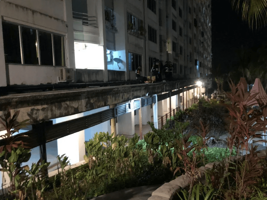 M'sian police at the condo where a Nigerian man fell from the 16th floor and died