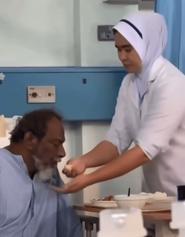 nurse feeding patient (1)